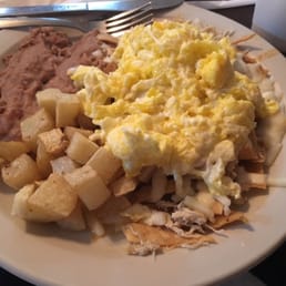 Chilaquiles (with eggs) Fried corn chip with eggs, shredded chicken, and beans! Incredible! Chilaquiles (with eggs) Fried corn chip with eggs, shredded chicken, and beans! Incredible!