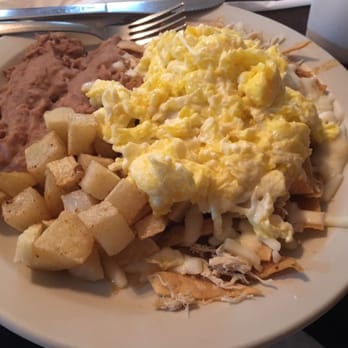 D'Tony's Mexican Restaurant - Chilaquiles (with eggs) Fried corn chip with eggs, shredded chicken, and beans! Incredible! - Mexican Near Me - Brownsville, Texas D'Tony's Mexican Restaurant - Chilaquiles (with eggs) Fried corn chip with eggs, shredded chicken, and beans! Incredible! - Mexican Near Me - Brownsville, Texas
