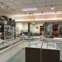 Coin & Stamp Shop At Washington State Conventn Ctr - Displays of coins & supplies