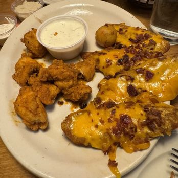Texas Roadhouse - The starter plater  Tater Skins Rattlesnake Bites Boneless Buffalo Wings - Steakhouses Near Me - Bedford, Texas