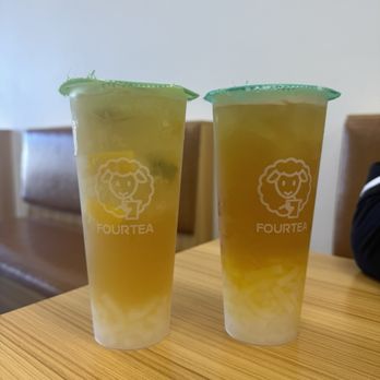 Fourtea - (L) $3 Lemon Tea with lychee jelly and (R) Pineapple Green Tea with lychee jelly (seasonal) - Coffee & Tea Near Me - Orange, California