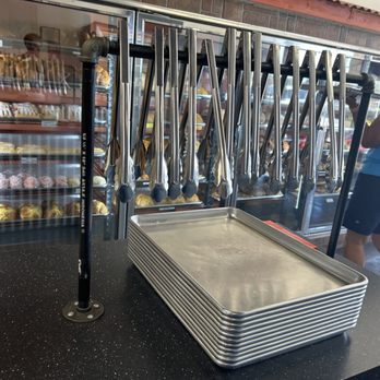 La Concha Feliz - Tongs and tray to gather your items with - Bakeries Near Me - Round Rock, Texas La Concha Feliz - Tongs and tray to gather your items with - Bakeries Near Me - Round Rock, Texas