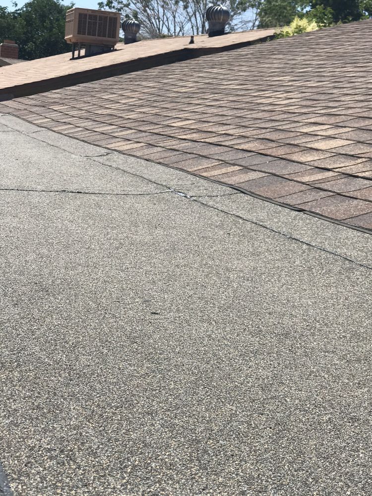 Slide of AV Roofing & Construction