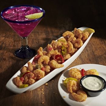 LongHorn Steakhouse - Our Patrón Dragon Fruit Margarita. Patrón Reposado Tequila, dragon fruit, pineapple, and all-natural sweet & sour. - Steakhouses Near Me - Fort Worth, Texas