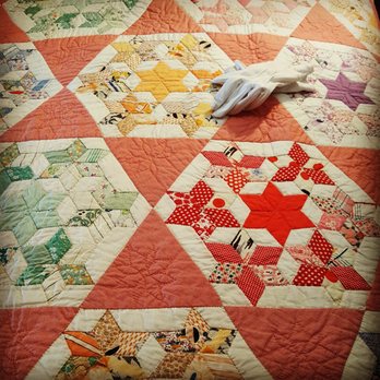 Iowa Quilt Museum - Bed turning display of quilts. - Art Museums Near Me - Winterset, Iowa Iowa Quilt Museum - Bed turning display of quilts. - Art Museums Near Me - Winterset, Iowa