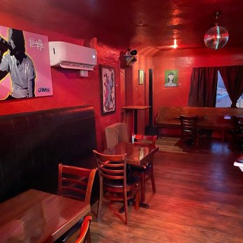 The Living Room Bar - a blurry image of a person walking by - Bars Near Me - El Paso, Texas The Living Room Bar - a blurry image of a person walking by - Bars Near Me - El Paso, Texas