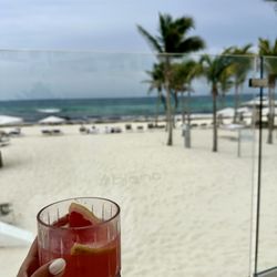 Le Blanc Spa Resort Cancun - Watermelon margarita with a beach view