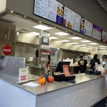 Chicken Shack - a man standing at the counter - Chicken Wings Near Me - Bloomfield Hills, Michigan