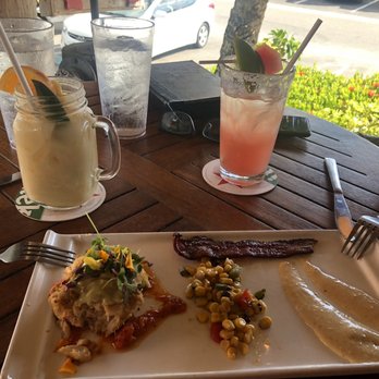 The Cottage - Crab cake with a painkiller II and a watermelon jalapeño margarita. Delicious!! - New American Near Me - Sarasota, Florida