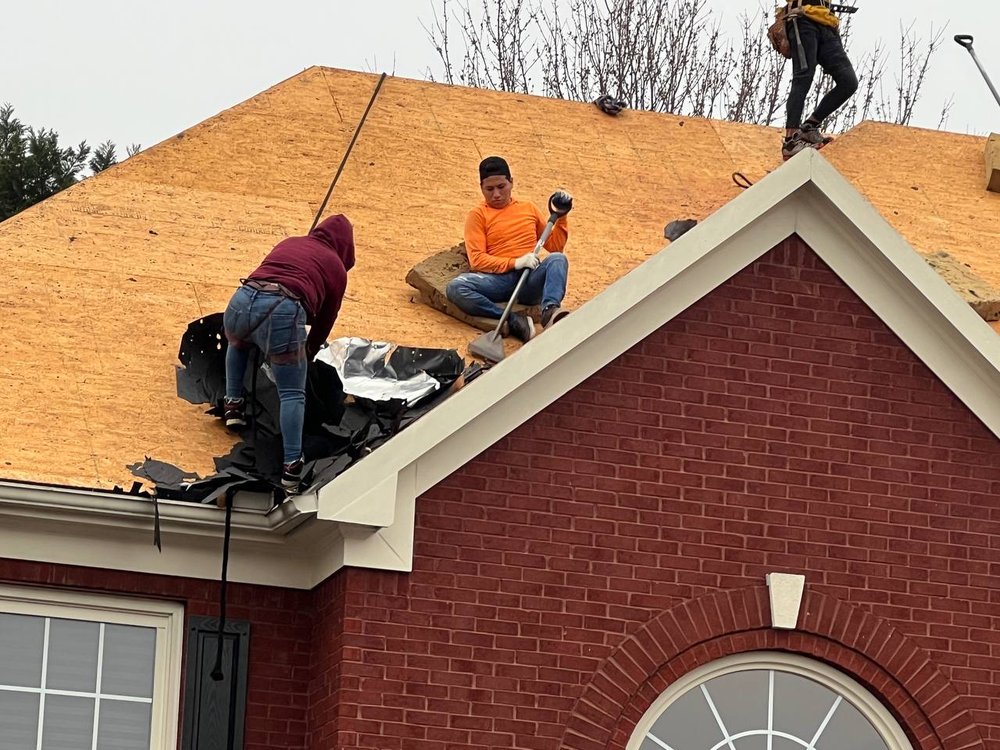 Slide of Top Notch Roofing & Construction