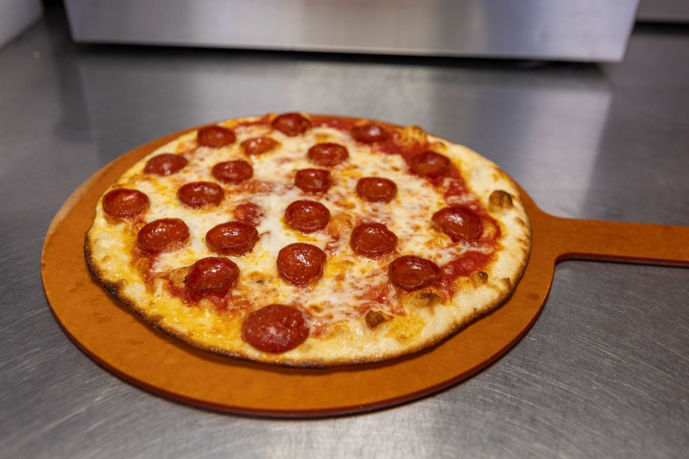 Stone Fire Pizzeria Logo