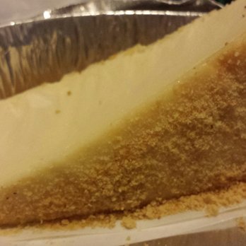 Italia Pizza - Ridiculously thin slice of cheesecake with graham cracker crumbs instead of graham cracker crust. - Pizza Near Me - Brooklyn, New York