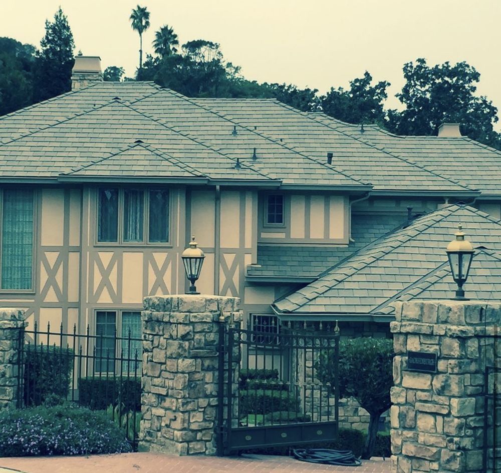 Slide of Exclusively Roofing