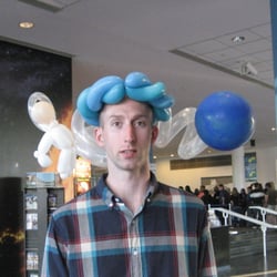 Ryan The Balloon Guy - Picture doesn't do it justice- plus the balloon was a day old.  Astronaut and planet Earth.  (This is not Ryan the Balloon Guy)