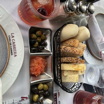 La Cabrera - bread tray with olives - Argentine Near Me - Sunny Isles Beach, Florida La Cabrera - bread tray with olives - Argentine Near Me - Sunny Isles Beach, Florida