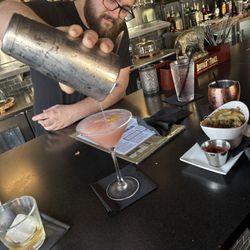 The Hangry Bison - RJ pouring my wife a Cosmo