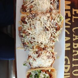 Hay Oaxaca with Al Pastor. Top to bottom: huaracha, sope, taco Hay Oaxaca with Al Pastor. Top to bottom: huaracha, sope, taco