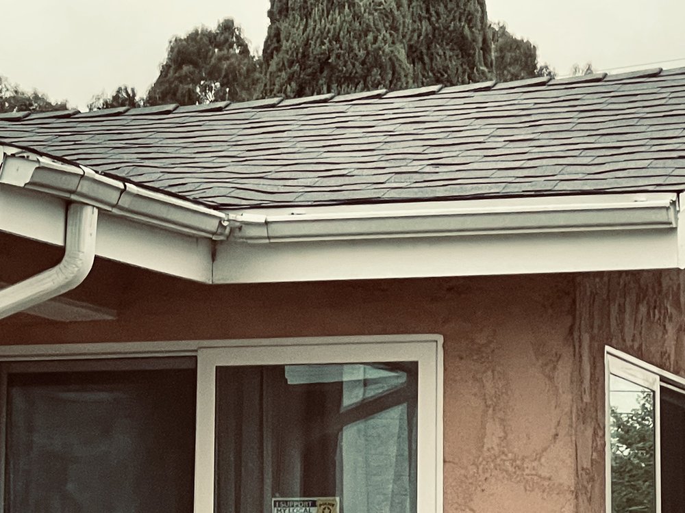 Slide of HGG Roofing