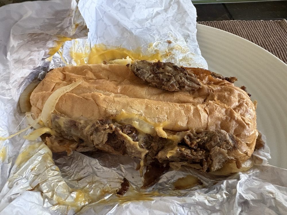Pardon My Cheesesteak Logo