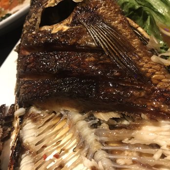 Salween Thai - Fried Whole Tilapia Topped with Papaya Salad - Thai Near Me - Omaha, Nebraska