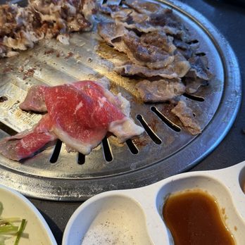K-Top Korean BBQ - This kind of grill makes the grease splatter on the table. It gets oily and messy. It even hit me a few times and stained my shirt. - Korean Near Me - Temecula, California K-Top Korean BBQ - This kind of grill makes the grease splatter on the table. It gets oily and messy. It even hit me a few times and stained my shirt. - Korean Near Me - Temecula, California