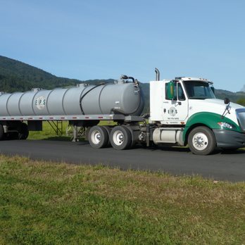 Environmental Pump Services - a large tanker truck on the road - Plumbing Near Me Environmental Pump Services - a large tanker truck on the road - Plumbing Near Me