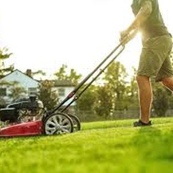 Allen & Allen Enterprise - a man mowing the lawn - Lawn Services Near Me Allen & Allen Enterprise - a man mowing the lawn - Lawn Services Near Me