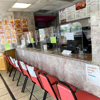 TJ Cajun Seafood & Pho - the counter and seating area - Cajun/Creole Near Me - Dallas, Texas