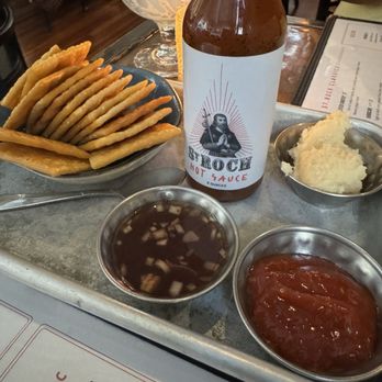 St. Roch Fine Oysters + Bar  - Toppings for Oysters - New American Near Me - Raleigh, North Carolina