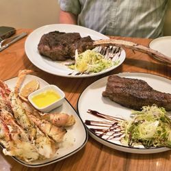King crab legs, tomahawk steak, ribeye