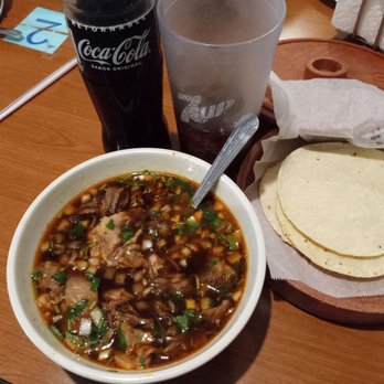 Hola Cabrito - Goat stew $13.95 with my $3.49 Mexican Coke.  4 handmade flour tortillas.  Goat pieces very tender and delicious . - Mexican Near Me - Phoenix, Arizona