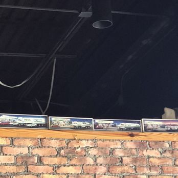 Dave's Pizza Garage - Just a small part of the display of a very large Hess truck collection. - Pizza Near Me - Tallahassee, Florida