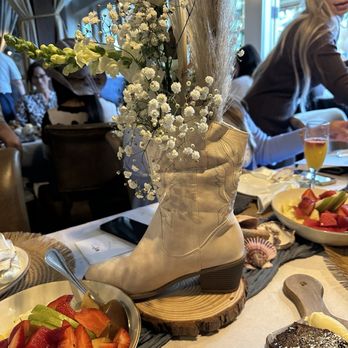 Danville Harvest - Fruit platter with Boots and Bubbly decorations - New American Near Me - Danville, California Danville Harvest - Fruit platter with Boots and Bubbly decorations - New American Near Me - Danville, California