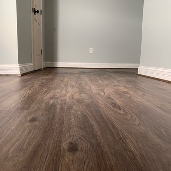 Welch Works - Vinyl Plank Flooring Installation and painting in a recently remodeled basement - Handyman Near Me Welch Works - Vinyl Plank Flooring Installation and painting in a recently remodeled basement - Handyman Near Me