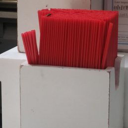 a box of red paper straws