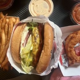 French Fries, bacon cheese burger, chicken finger. French Fries, bacon cheese burger, chicken finger.