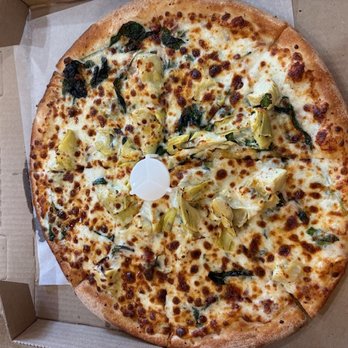 Johnny's Pizza - Chicken bacon artichoke. Most artichoke in the center 1/2. Crust is a tad thicker than what I would consider "thin". - Pizza Near Me - Meridian, Idaho Johnny's Pizza - Chicken bacon artichoke. Most artichoke in the center 1/2. Crust is a tad thicker than what I would consider "thin". - Pizza Near Me - Meridian, Idaho