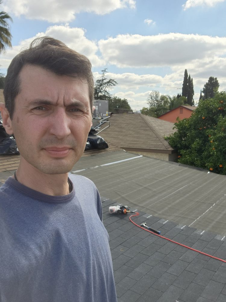 Slide of Archyk Roofing