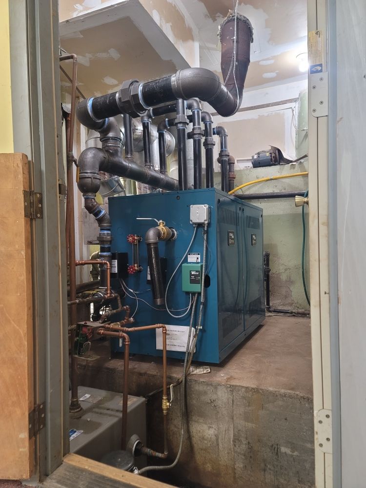 Slide of T&E Plumbing and Heating