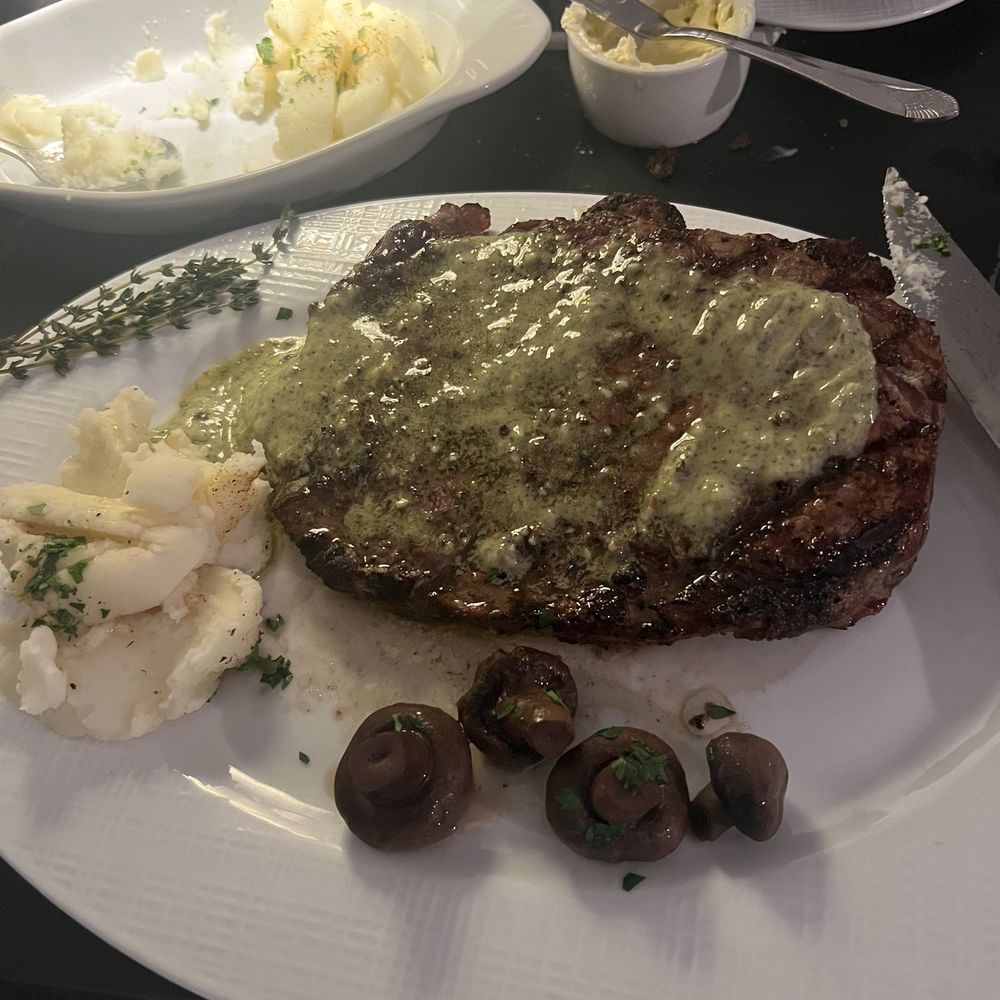 Monroe’s - Steak in a butter sauce with garlic mashed potatoes and mushrooms. - Steakhouses Near Me - Monroe, Louisiana Monroe’s - Steak in a butter sauce with garlic mashed potatoes and mushrooms. - Steakhouses Near Me - Monroe, Louisiana