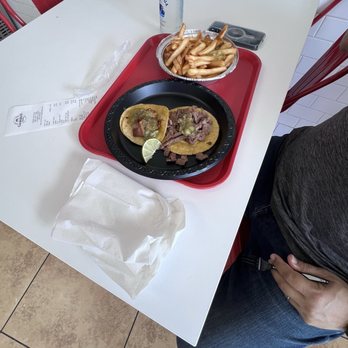 Guanatos Tacos - Street taco and regular taco. Much smaller in person than looks in pic - Tacos Near Me - Sylmar, California Guanatos Tacos - Street taco and regular taco. Much smaller in person than looks in pic - Tacos Near Me - Sylmar, California