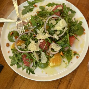 Los Fuegos - Pink Grapefruit Salad  with orange, avocado, red onion, roasted hazelnuts and aged parmigiana. Light & refreshing! - Argentine Near Me - Miami Beach, Florida
