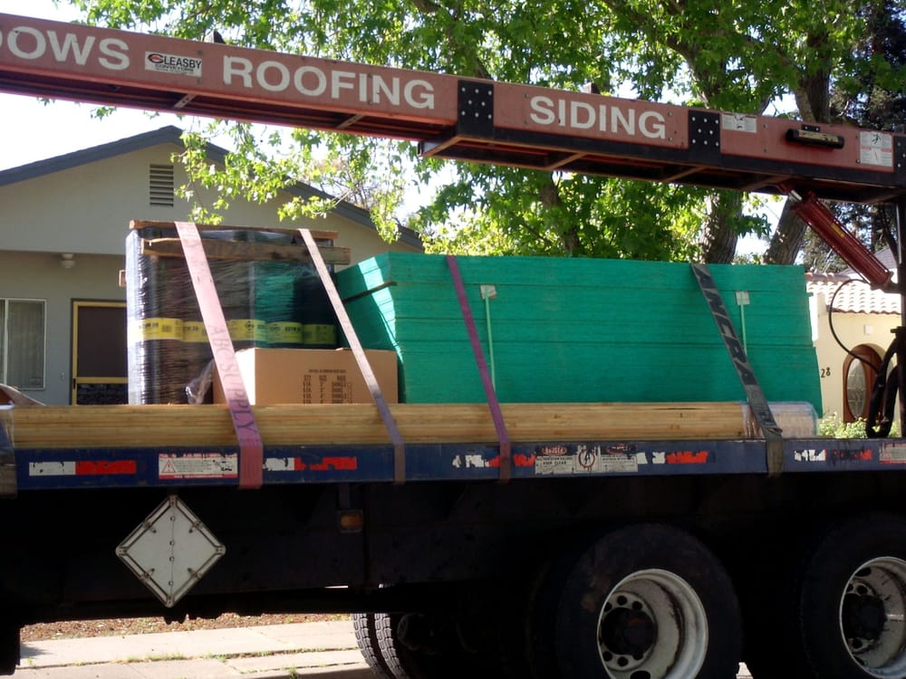 Slide of Signature Roofing