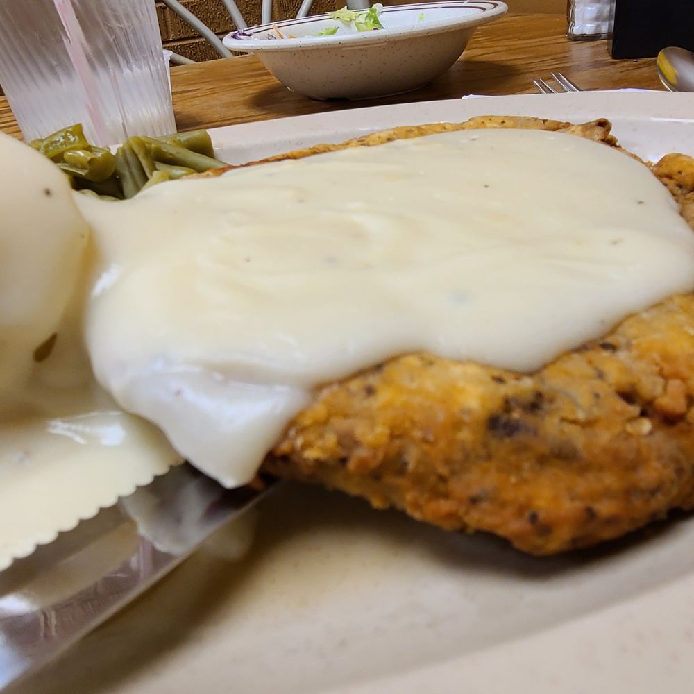 Drovers Culinary Cafe - Chicken Fried Steak with white gravy, close up. - Cafes Near Me - Brush, Colorado
