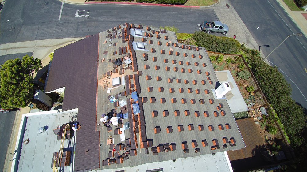 Slide of Nolanco Roofing