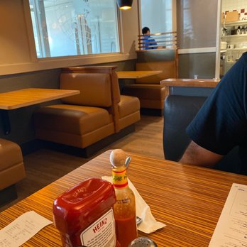 IHOP - a man sitting at a table in a restaurant - Breakfast & Brunch Near Me - San Diego, California IHOP - a man sitting at a table in a restaurant - Breakfast & Brunch Near Me - San Diego, California