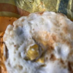 McDonald's - In one picture, in the middle of the egg there is a piece of sausage on the egg- John put sausage on it.