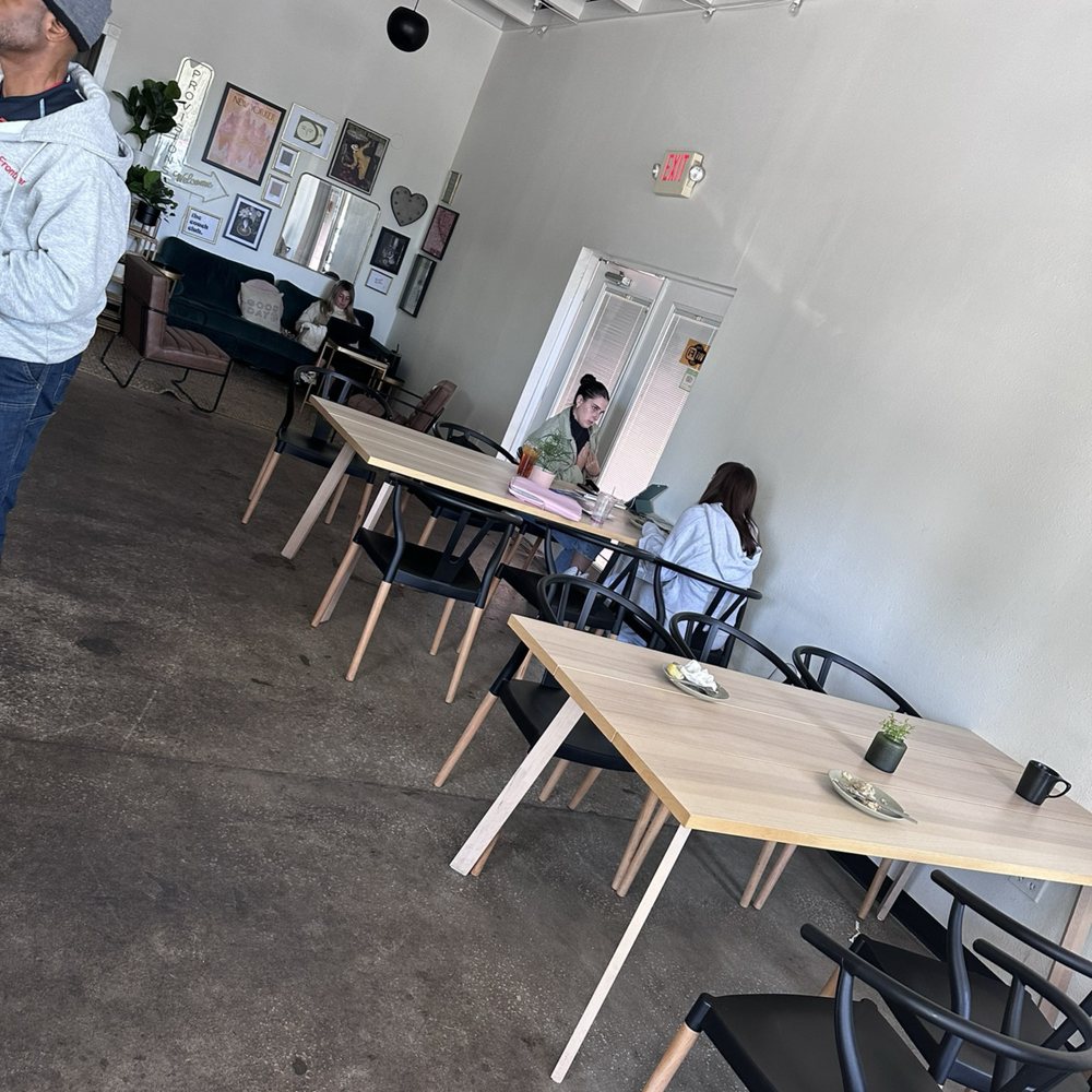 Provisions Coffee & Kitchen - a man standing in a coffee shop - Coffee & Tea Near Me - Tampa, Florida Provisions Coffee & Kitchen - a man standing in a coffee shop - Coffee & Tea Near Me - Tampa, Florida