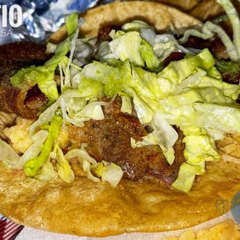 El Tio Mexican Restaurant - a taco with lettuce and meat - Mexican Near Me - Dacula, Georgia