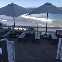 tables and umbrellas on the beach